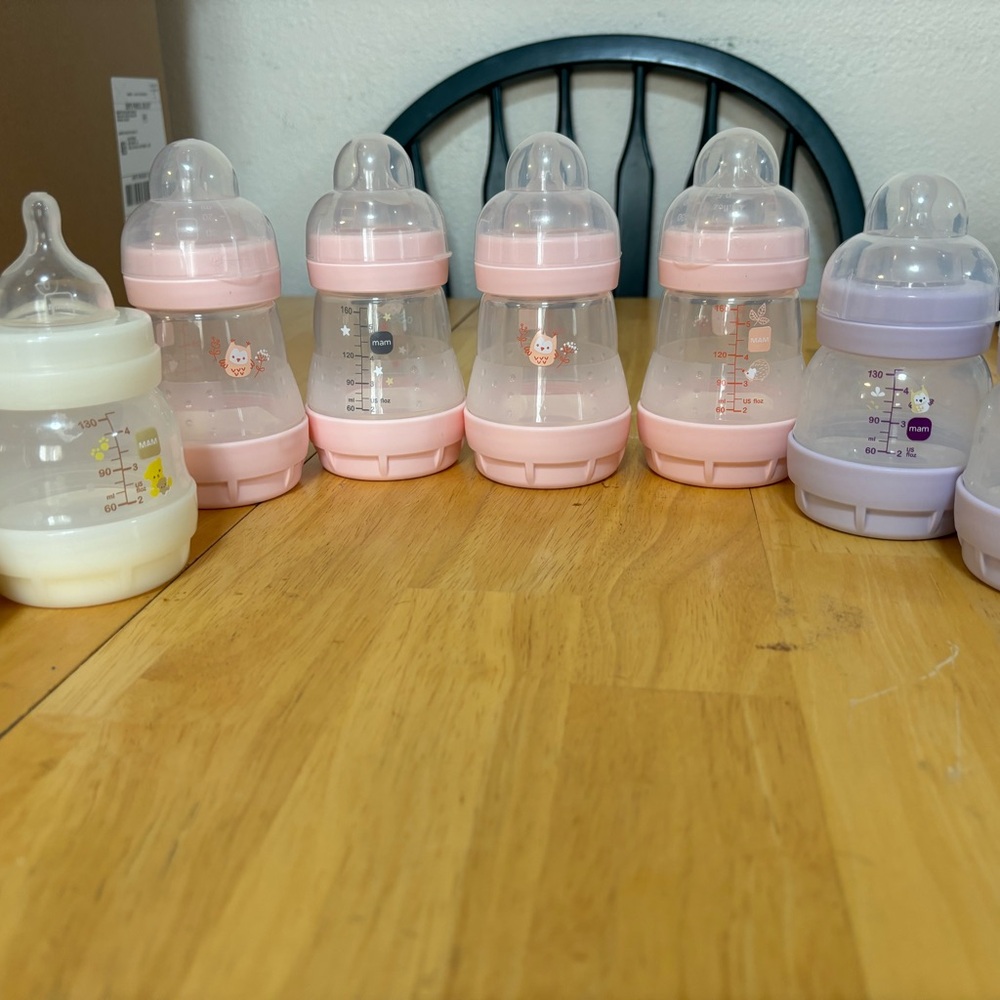 Set of Pink and Purple Baby Bottles